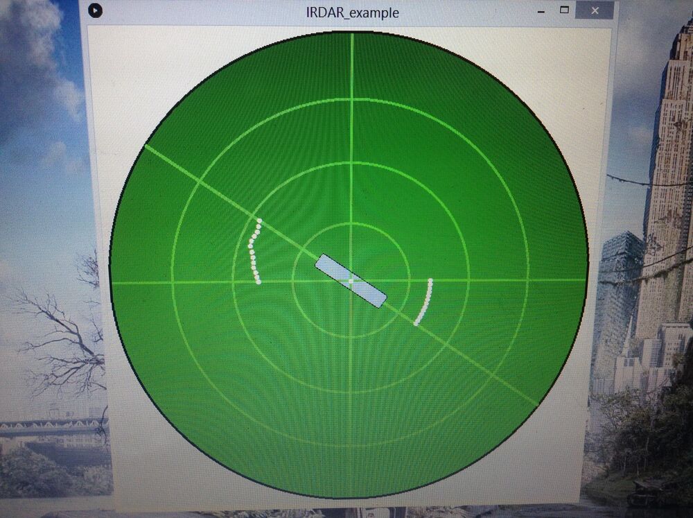 The IRDAR radar display running on a monitor, showing the sweep bar and two short arcs of detected points from the two sensors