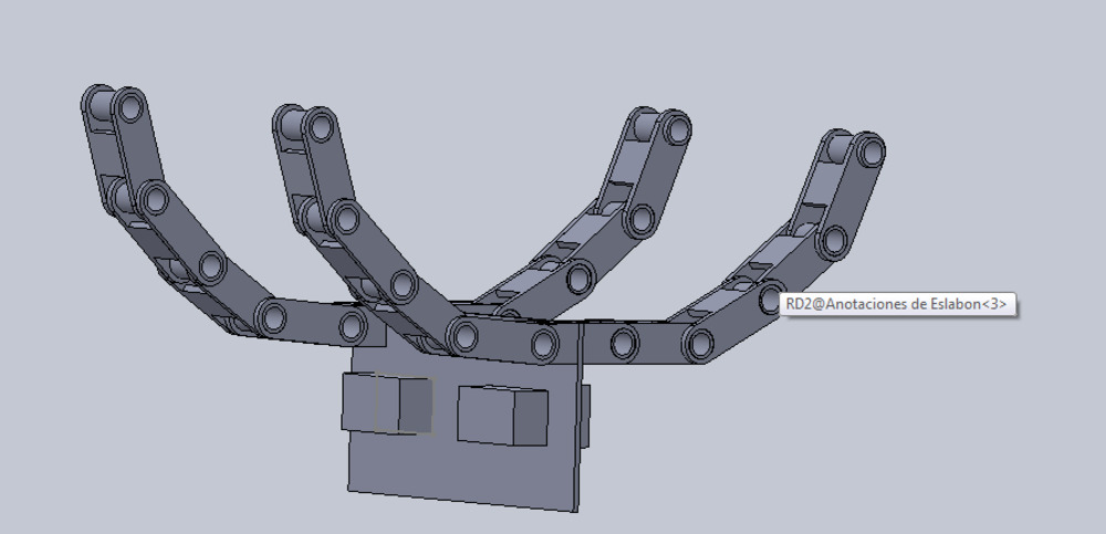 SolidWorks render of the articulated link-chain arm that couples the system to a longitudinal reference axis of the car